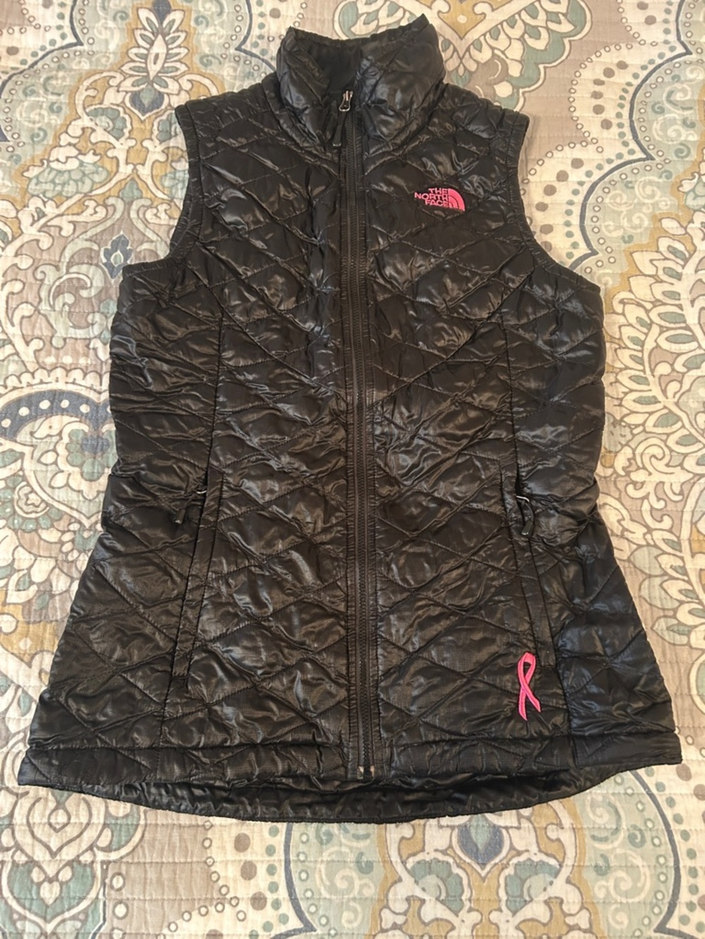 The North Face Black Quilted Vest with Pink Logo